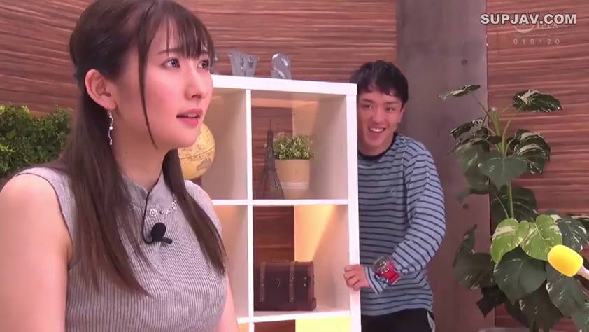 Indoor · Stand · Medium shot · Smile · Sleeveless top · Microphone · Peeping · Male and female